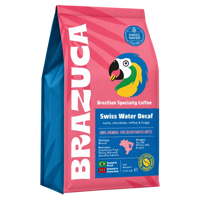 A 250g bag of Brazuca Swiss Water Decaf coffee, featuring a vibrant pink and blue design with a colorful parrot illustration and white vertical branding text.